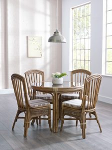 Modern conservatory dining table and chair in lighted room Oxford